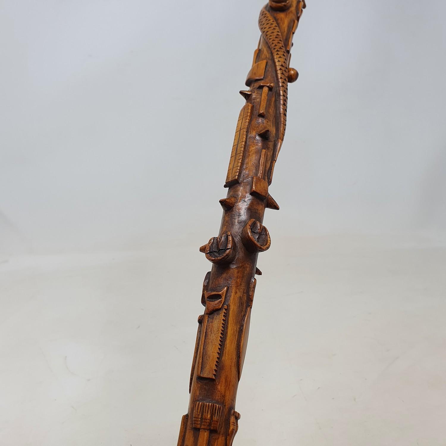 A 19th century one piece folk art walking stick, staff carved with animals, implements, and sporting - Image 4 of 6