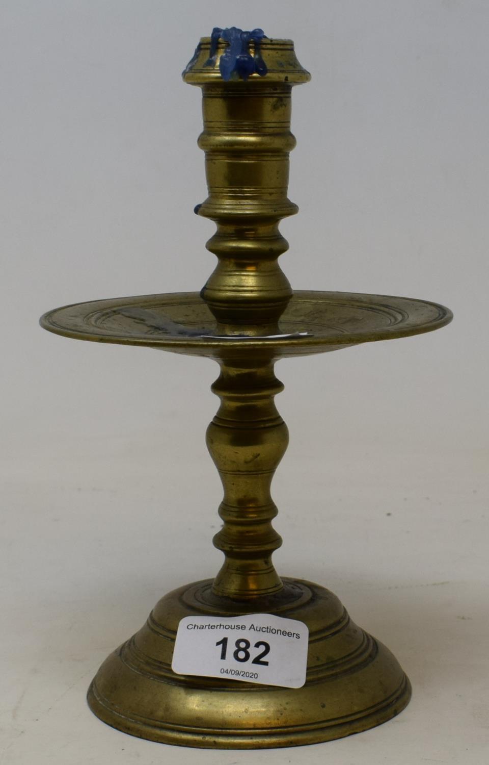 An 18th century style brass candlestick, 20 cm high