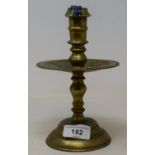 An 18th century style brass candlestick, 20 cm high