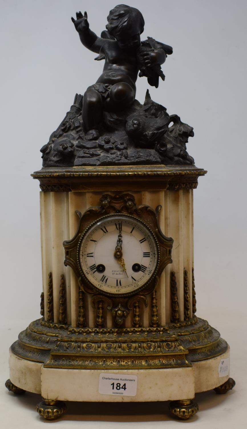 A late 19th century French mantel clock, the 8 cm diameter enamel dial signed Chaude, with Roman