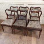 A set of six Victorian rosewood dining chairs, with drop in seats and turned front legs (6) Report