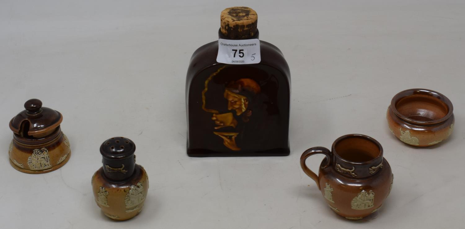 A Royal Doulton Kingsware bottle, 14 cm high and a Doulton stoneware cruet (5)