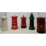 A Honiton pottery novelty money box in the form of a letter box, and other novelty letter boxes (