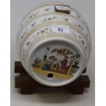 A 19th century Dresden spirit barrel, ends decorated in the Chinese manner, body with horizontal