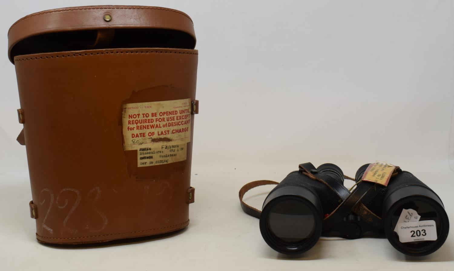 A pair of Canadian WWII binoculars, dated 1945, in a leather case