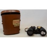 A pair of Canadian WWII binoculars, dated 1945, in a leather case