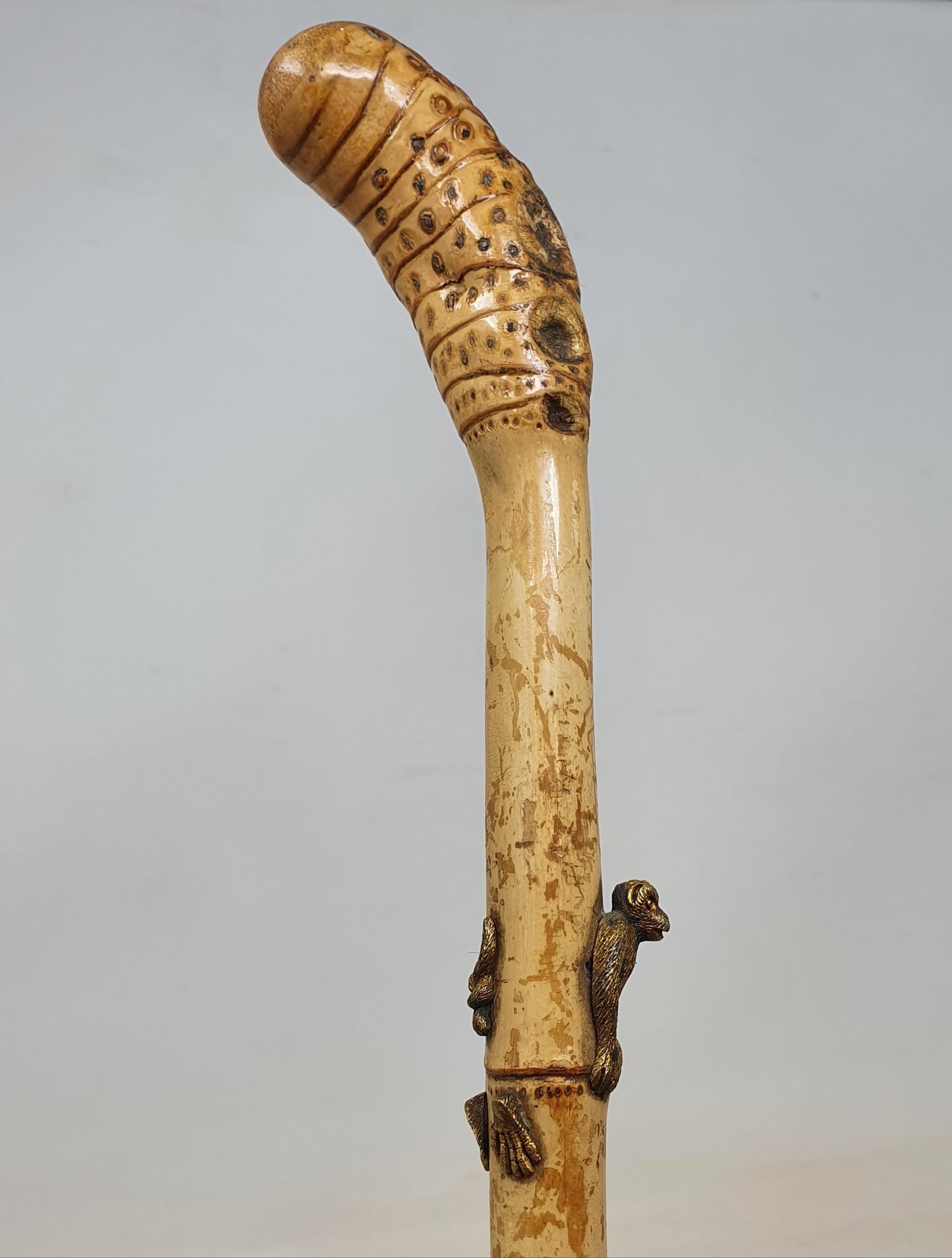 A 19th century bamboo cane inset with a brass monkey, 92 cm - Image 3 of 4