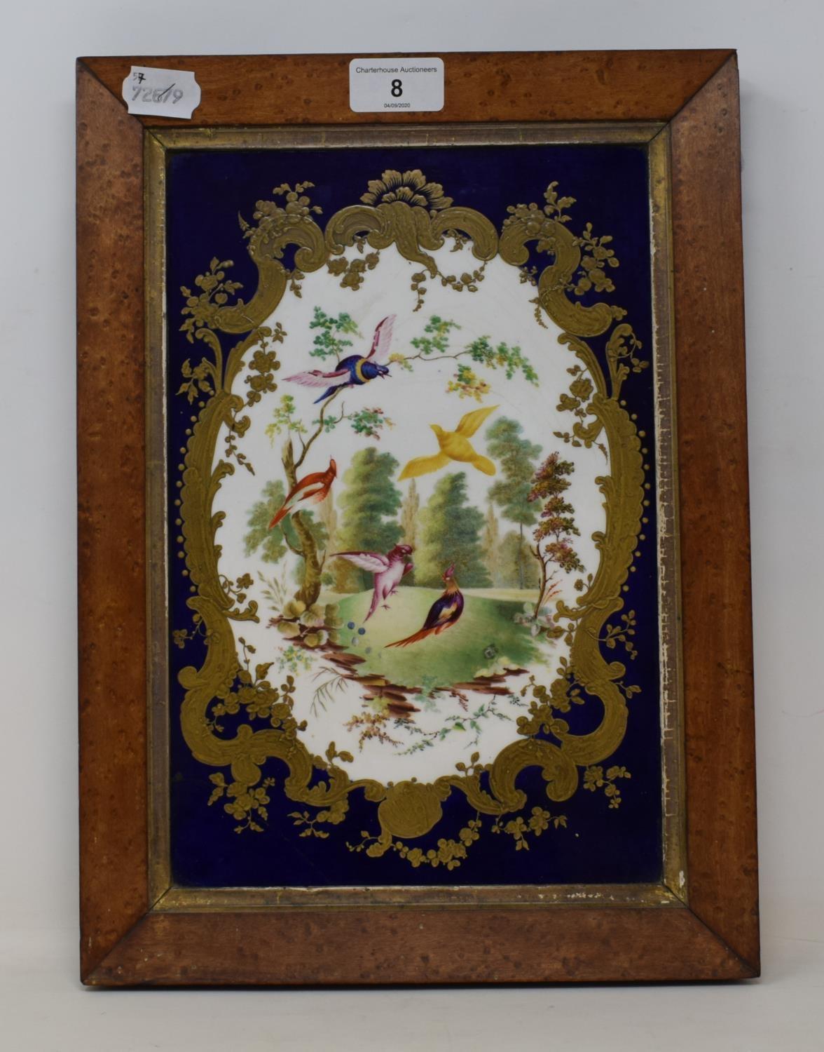 A 19th century Sevres style porcelain plaque, central cartouche, decorated with landscape and exotic