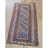 A Caucasian Shirvan rug, 220 x 111 cm