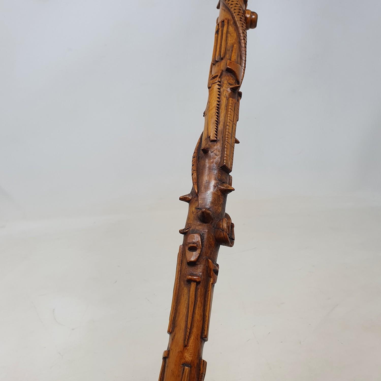 A 19th century one piece folk art walking stick, staff carved with animals, implements, and sporting - Image 3 of 6