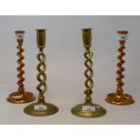 Two pairs of brass barley twist candlesticks, tallest 26 cm high