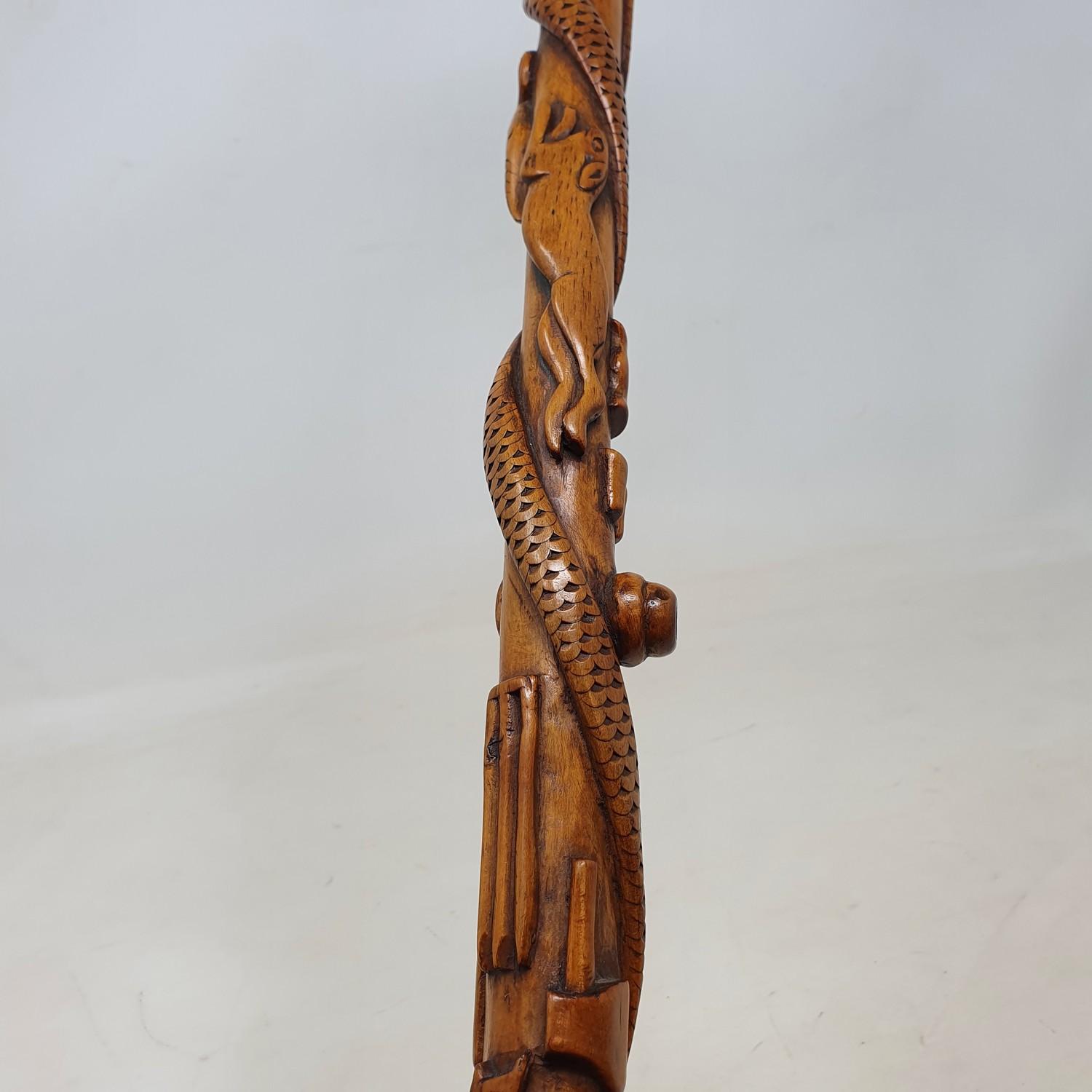 A 19th century one piece folk art walking stick, staff carved with animals, implements, and sporting - Image 2 of 6