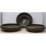 A set of three Japanese bronze censors, 30 cm diameter, and another similar, 20 cm diameter (4)