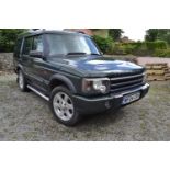 A 2004 Land Rover Discovery ES Premium, registration number WF04 CRV, metallic green, black