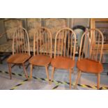 A matched set of nine Ercol type hoop back chairs (9)