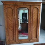 A Victorian satin birch three door wardrobe, 190 cm wide x 211 cm high