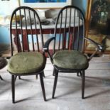 A pair of dark stained Ercol armchairs, and a matching pair of single chairs (4)