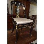 A Victorian papier mache chair, on cabriole front legs