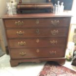 A George III style mahogany chest of four long drawers, 92 cm wide x 83 cm high