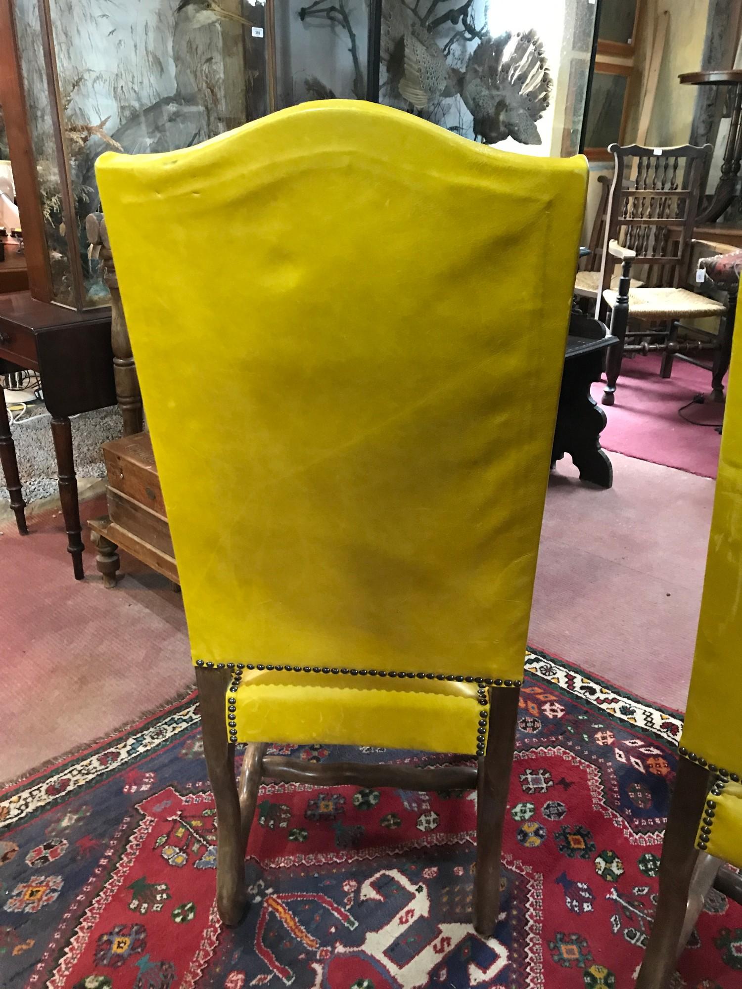 A set of eight dining chairs, upholstered in yellow leather, on shaped legs - Image 6 of 7