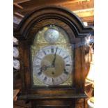 A dwarf longcase clock, the 19 cm arched square brass dial with Roman numerals and Tempus Fugit to