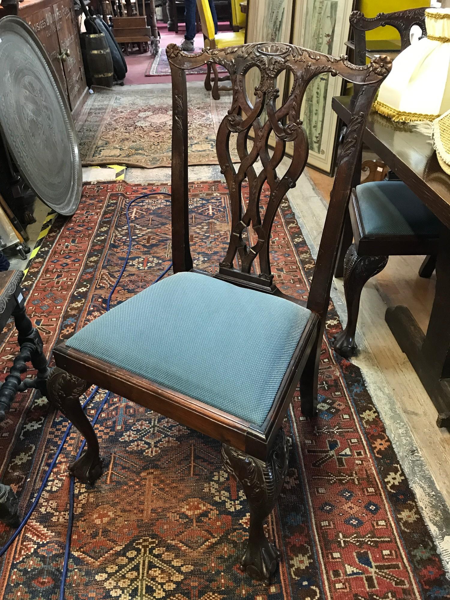 A set of nine George III style dining chairs