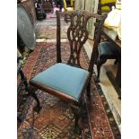 A set of nine George III style dining chairs