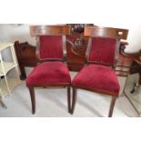 A pair of Regency mahogany dining chairs on sabre legs (2)