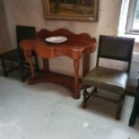 A Victorian washstand, with a shaped front, 116 cm wide, a pair of 18th century style leather