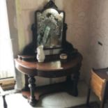 A Victorian mahogany duchess type dressing table, with a distressed mirror plate, 120 cm wide