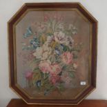 A Victorian floral needlework panel, 64 x 54 cm, in a later octagonal frame
