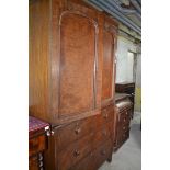 A Victorian mahogany linen press, the top adapted for hanging, above drawers, 123 cm wide x 218 cm