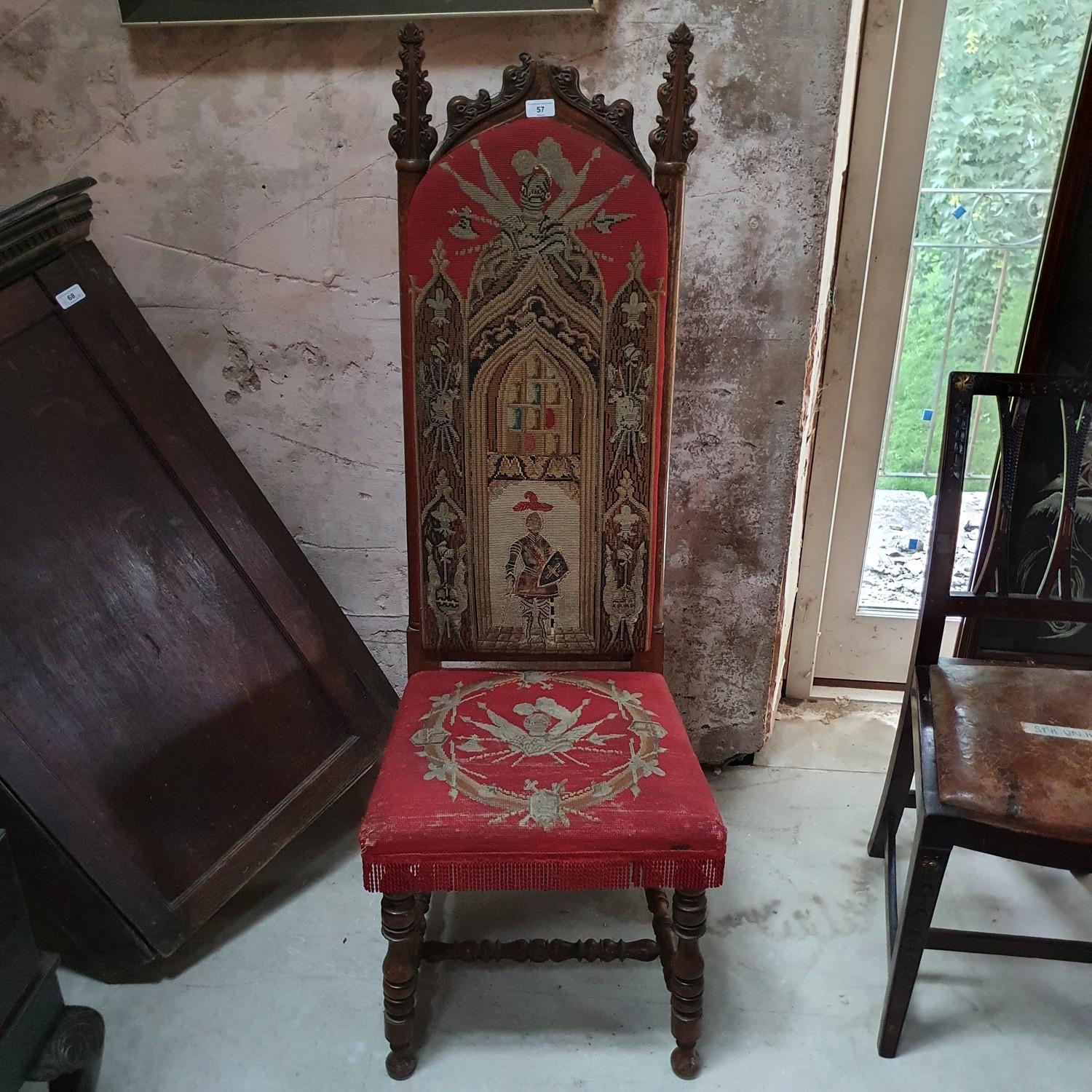 A Victorian Gothic walnut prie dieu chair, with needlework upholstery, wormed, lacks finial