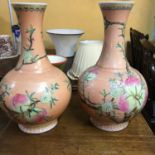 A pair of Chinese vases, decorated peaches, 40 cm high