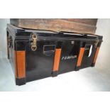 A black painted travelling trunk, P D Butler, 89 cm wide