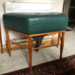 A pair of leather upholstered stools, on turned legs, 97 cm wide x 66 high