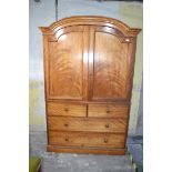 A Victorian satin birch linen press, 128 cm wide, with shelves