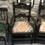 A pair of Derbyshire style carver chairs, two other carver chairs, and four single chairs