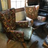 A pair of retro wing armchairs
