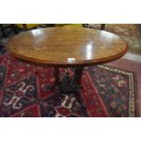 A Victorian inlaid walnut oval table, 86 cm wide, and a mahogany table, 76 cm wide