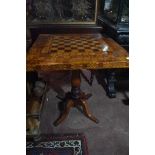A Victorian occasional table, the top inlaid for chess, and with parquetry decoration, 60.5 cm wide
