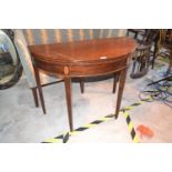 A 19th century inlaid mahogany D shaped card table, on tapering square legs, 95 cm wide