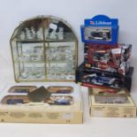 Assorted Swarovski style animal figures, in a glass case and various boxed toy cars (box)