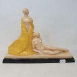 An Art Deco figural group, signed G. Deblaize, 28 cm high Small losses to base, various firing