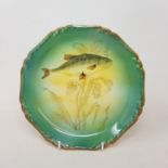 A late 19th century German Franzant Mehlem fish service, comprising, two oval plates, sixteen plates