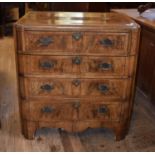 A 1920's walnut dressing chest, the top drawer fitted with mirror and various compartments, above