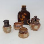 A Royal Doulton Kingsware bottle, 14 cm high and a Doulton stoneware cruet (5)