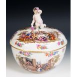 A Berlin porcelain punch bowl and cover, with a putto finial, decorated extensive scenes of