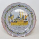 An 18th century style pottery plate decorated with an execution scene, two other Delft plates, a set