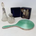 A Victorian small silver travelling communion set, cased, a silver and enamel hand mirror, and two